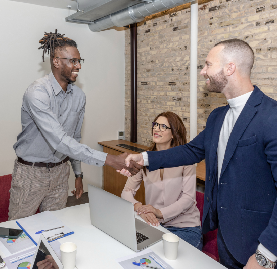 multi-ethnic-businessmen-shaking-hands-and-smiling-2025-05-30-14-51-56-utc
